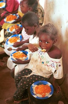 Children receiving nutritious meals through our hunger relief program